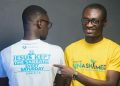 man in yellow crew neck t-shirt wearing black framed eyeglasses